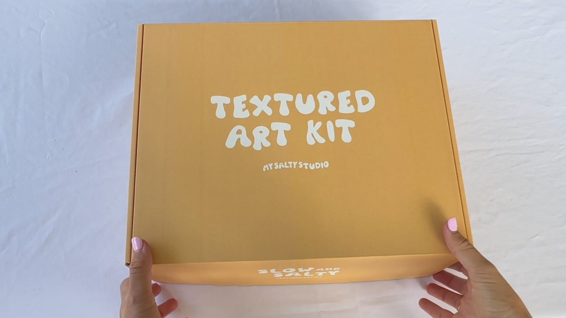 Load video: This video showcases what is inside the textured art kit box